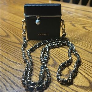 CHANEL Black Mini Bag with Gold Chain
